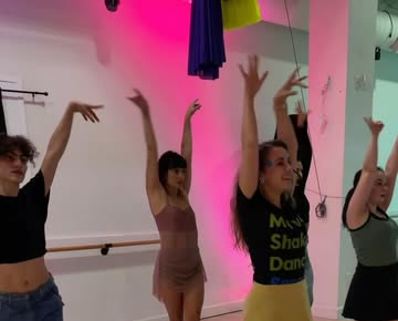Inna teaching a group class